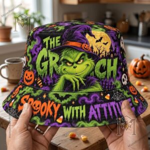 Hat brim featuring spooky attitude text, candy corn, and spiderwebs