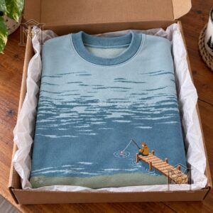 Fishing Vintage Pier Scene Sweatshirt - front view highlighting blue ribbed cuffs and collar