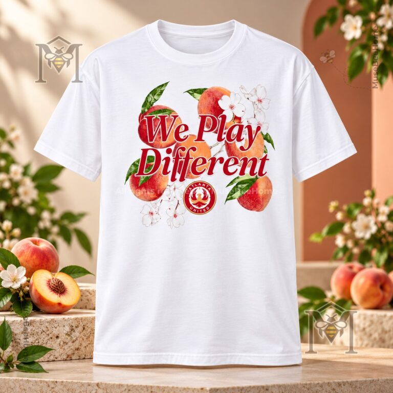 Atlanta United FC We Play Different Georgia Peach T-Shirt - front view with peach floral graphic