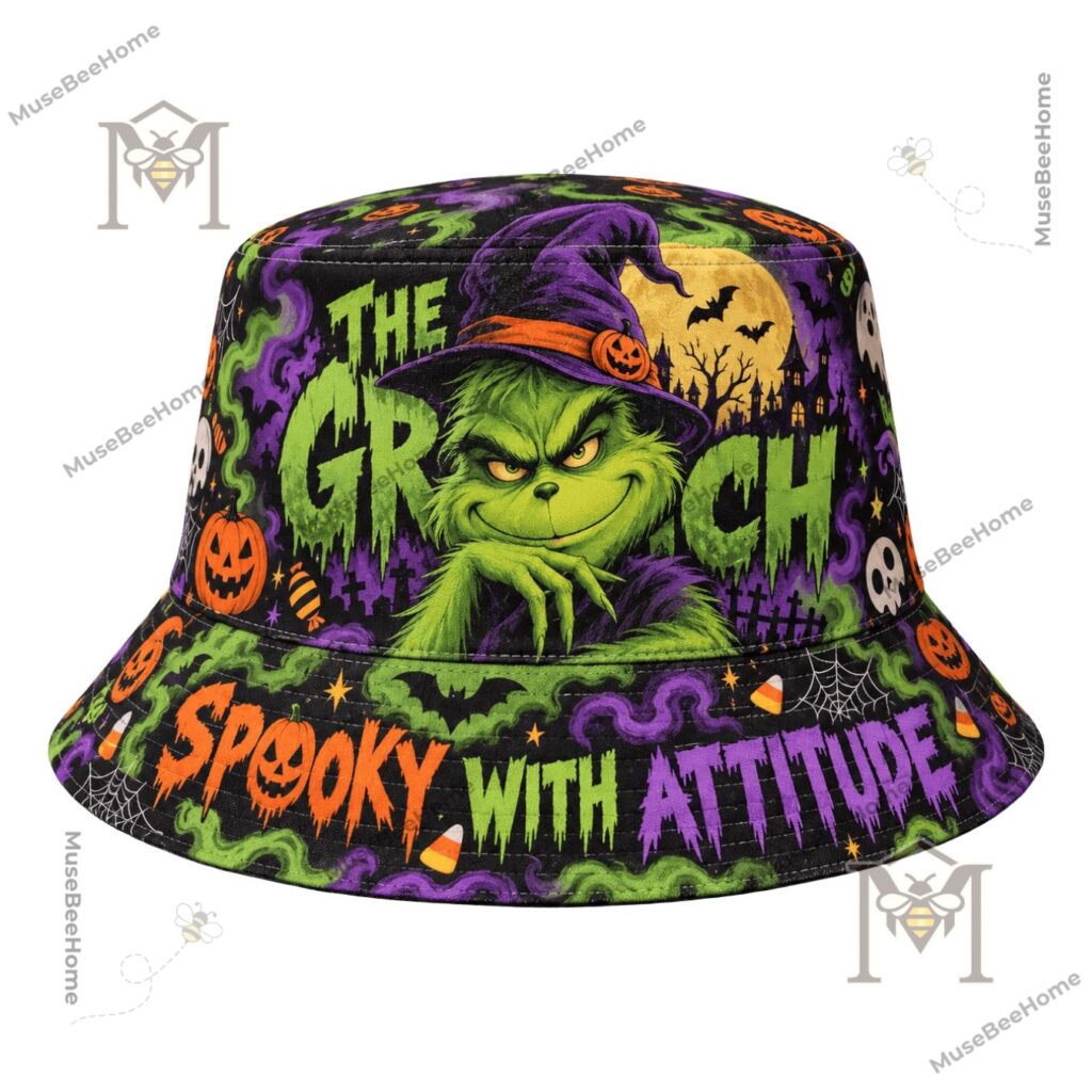 Close-up of green Grinch face wearing a purple witch hat