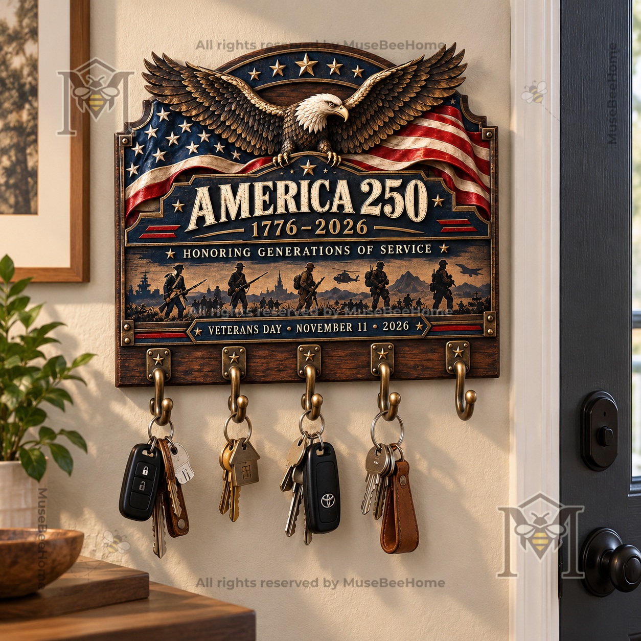 Wall-mounted key rack showing Veterans Day 2026 service silhouettes and lettering